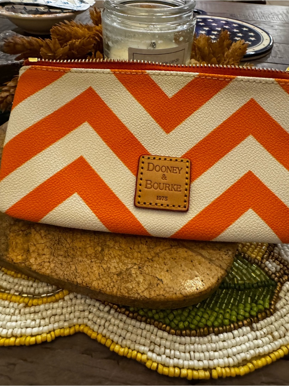 Dooney & Bourke Orange and Cream Chevron Zip Pouch